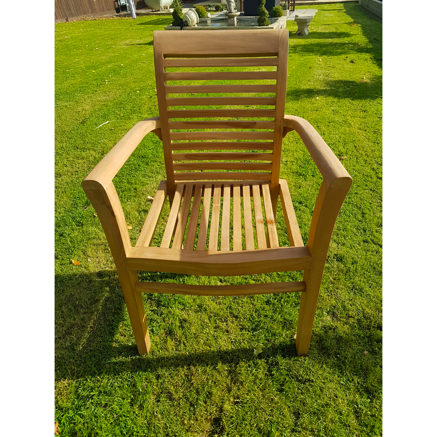 Teak extending table with 8 stacking chairs