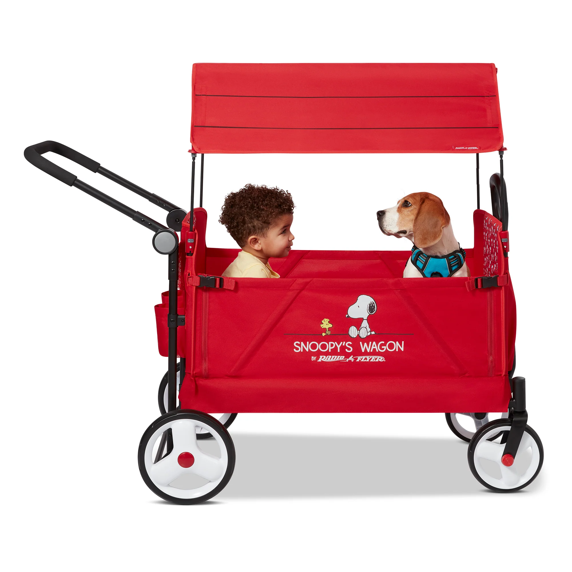Snoopy™ Peanuts™ Kinderwagen (Modelljahr 2025) – Fahrspaß für Kinder und Haustiere. Bequeme Sitze. Das kultige rote Dach. Bewährte Radio Flyer Qualität.